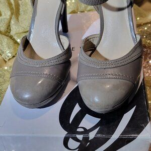 Women's Taupe heels with ankle strap and close toe in size 6.5